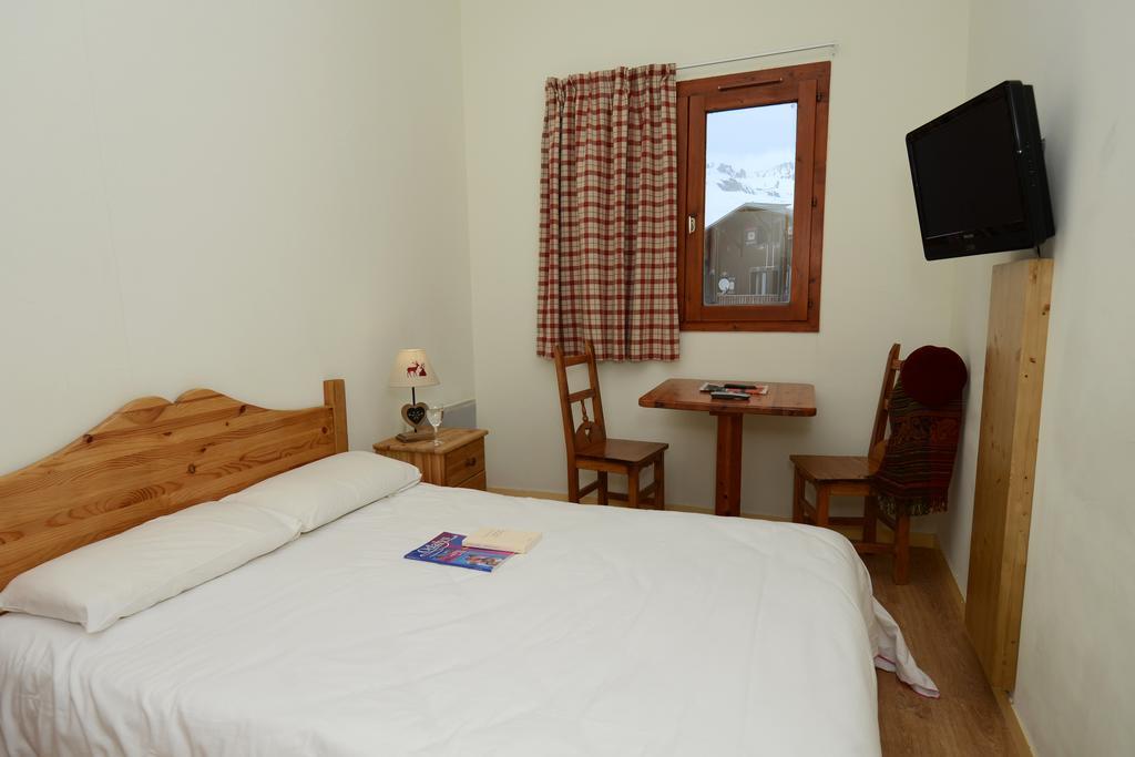 Hôtel Odalys Chalet Alpina Tignes Rom bilde
